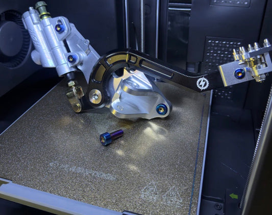 VoltMoto X EmotoTintz Titanium Surron Ultra Bee Footbrake V3